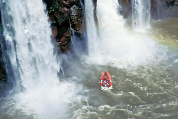 Tourist boat above of the Iguaçú Waterfalls in Brazilian Side, Foz do Iguaçu City, Paraná State.