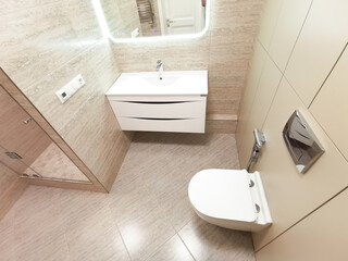 renovation in the bathroom with designer tiles