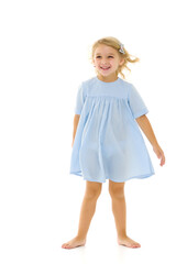 Little girl in an elegant dress.The concept of a happy childhood, healthy lifestyle.