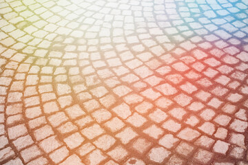 Bright paving tiles in the form of a mosaic laid out in a semicircle. Background for designers.