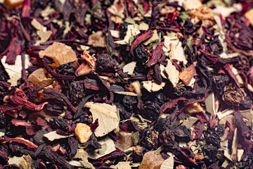 Macro from assorted tea leaves and fruits
