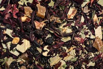 Macro from assorted tea leaves and fruits
