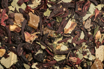 Macro from assorted tea leaves and fruits
