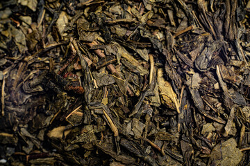 Macro from assorted tea leaves and fruits
