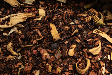 Macro from assorted tea leaves and fruits
