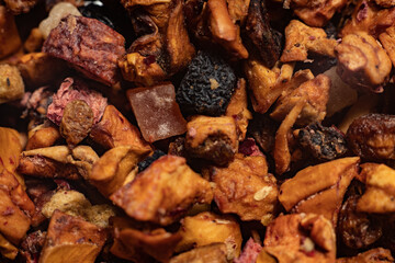 Macro from assorted tea leaves and fruits

