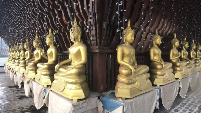 Colombo, Sri Lanka, November 22, 2019, 61 Sri Jinarathana Rd, Gangaramaya Temple all Buddhas view from the corner