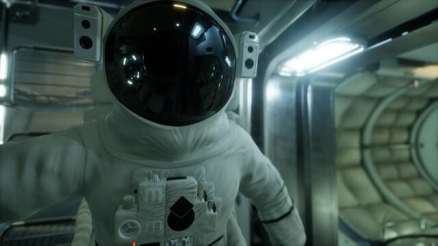 astronaut inside the orbital space station. Elements of this image furnished by NASA.