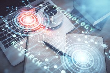 Multi exposure of data theme drawing hologram over topview work desk background with computer. Concept of technology.