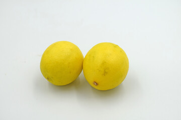 fresh lemons on white background