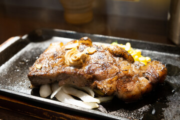 grilled steak on hot plate