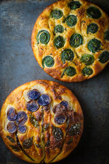 Focaccia with blue potatoes and fiddlehead ferns