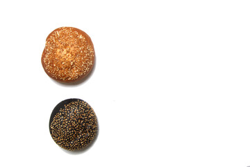 colon made of two scones on white background flat lay