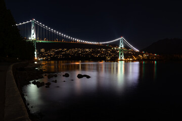 Fototapeta premium View of Lions Gate Bridge in Vancouver Canada at night from Stanley Park