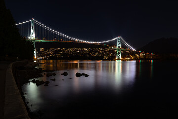 View of Lions Gate Bridge in Vancouver Canada at night from Stanley Park