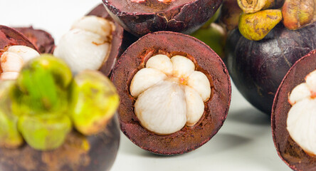 Closeup of fresh ripe mangosteen fruits, queen of fruits