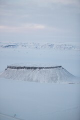 Aerial shot of the Dundas mountain covered in snow in Thule, Greenland © Washington Chua1/Wirestock