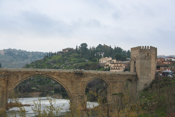 Fototapeta na wymiar Roman bridge Puente de Alcántarain Toledo Spain