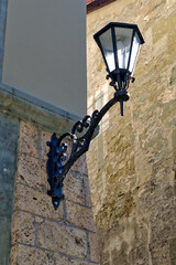 Old street lamp made of cast iron in Fribourg (Freiburg), Switzerland