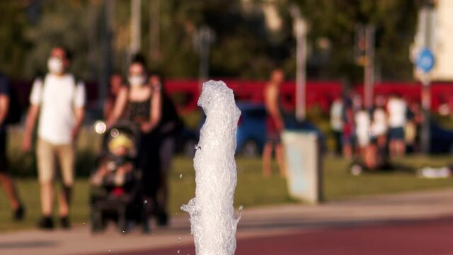 Recreation Human Activities Behind Fountain Water Droplets View