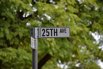 Twenty fifth/25th Avenue road sign/street name