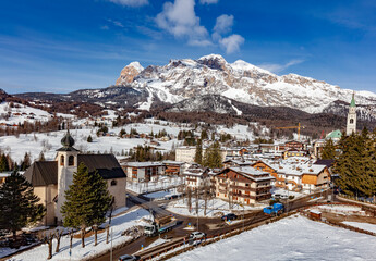Fototapeta na wymiar View of the downtown of Cortina, a town and comune in the heart of the southern Alps in the Veneto region of Northern Italy. 
