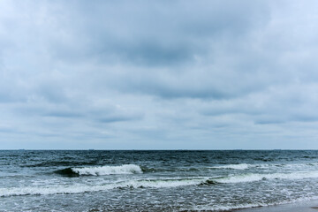 Coastline in the background of dark clouds