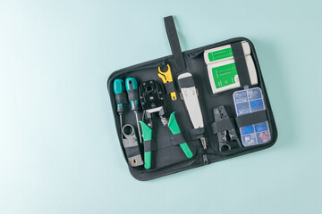 A set of tools for connecting communication cables in the case.