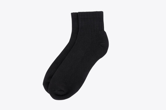Blank black socks mockup isolated on white background with clipping path.