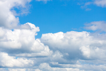 Naklejka na ściany i meble blue sky background with tiny clouds in summer season