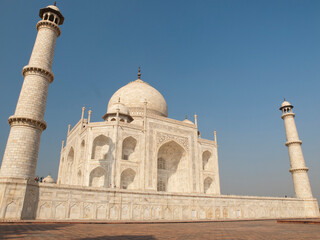 Fototapeta na wymiar Beautiful white marble of the Taj Mahal seen from east side, Agra, Uttar Pradesh, India.