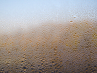 Water drop on a window as texture background.