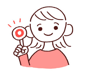 正解の札を持つ若い女性