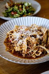 Reginette pasta with pork Bolognese sauce
