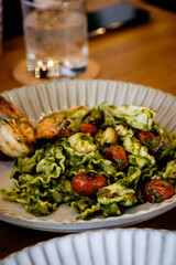 Reginette pasta with seafood pesto sauce