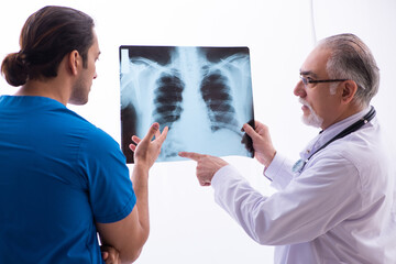 Two male doctors working in the clinic