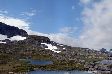 Views from the train window. Mountain tundra of Central Norway. Railway travel in Norway.The Bergen...