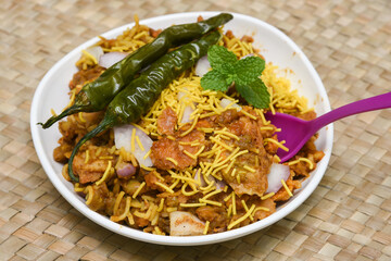 Spicy Pani puri golgappe and  potato stuffing, Chat item, India. panipuri, North Indian street food snack served with tangy tamarind water, chaat masala, chickpeas Delhi, Mumbai, Rajasthan, Bangalore