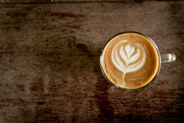 cup of coffee on wood floors