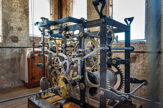 Clock mechanism inside of Torre delle Ore clock tower in Lucca. Italy