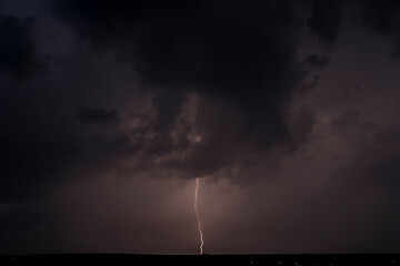 Lightnings in Summer Storm with Dramatic Clouds