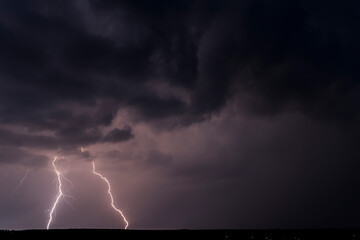 Lightnings in Summer Storm with Dramatic Clouds