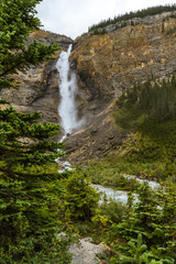 The Rocky Mountains. Majestic Takakkaw Falls waterfall on rock face and Takakkaw stream   in Yoho National Park, British Columbia, Canada. 