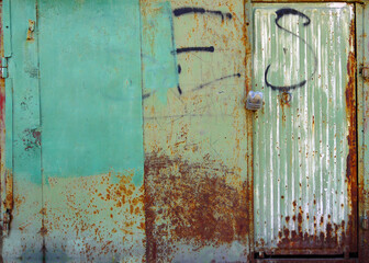 Metal garage doors painted like abstract paintings