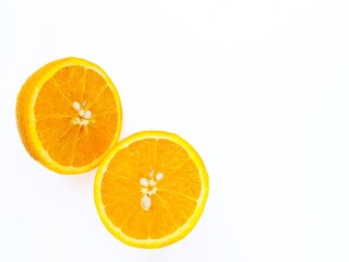 Juicy bright sweet orange on a white background close-up. Place for the buyer's text.