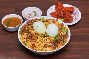 Chicken Biryani is a savory chicken and rice dish that includes layers of chicken, rice, and aromatics that are steamed together.