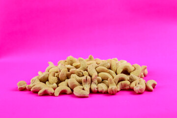 the cashew on pink background