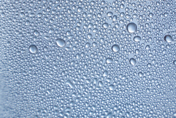 blue water drops on glass