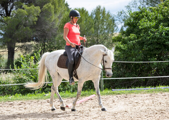 riding girl and horse
