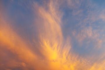 Clouds painted in the color of sunset